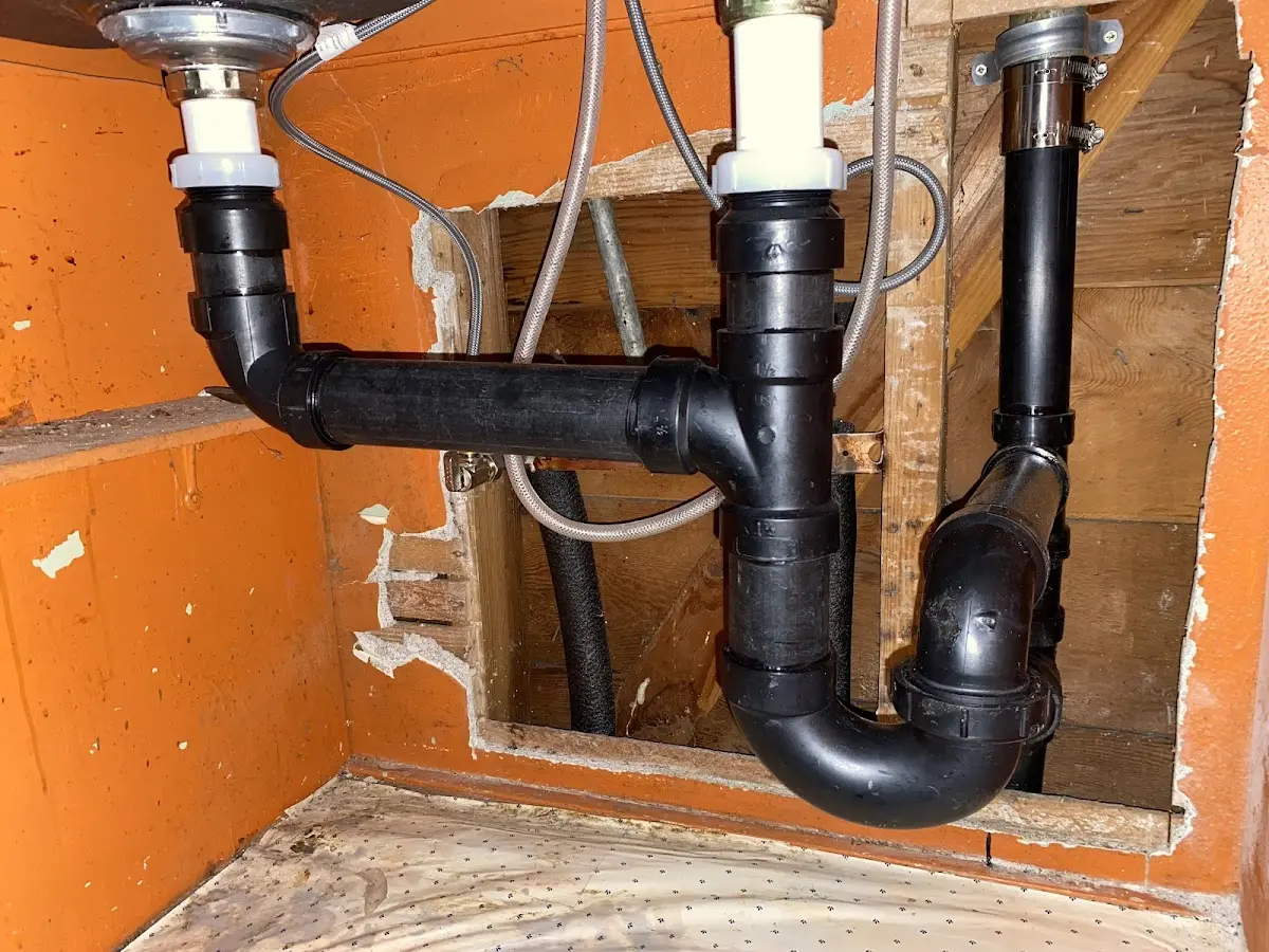 Professional Garbage Disposal Repair equipment and tools on the job in Webster City